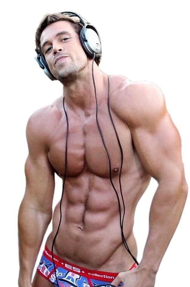 handsome, hunk, guy wearing headphones, DJ.